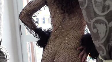 Esibizionista sul balcone vista Colosseo